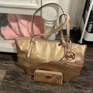 Metallic shoulder Michael kors purse and wallet